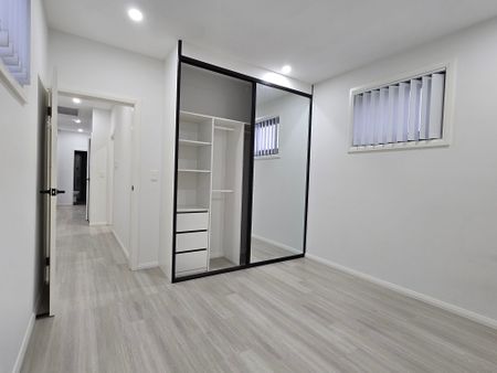 Near New Three-Bedroom Townhouse in a Prime Location! - Photo 4