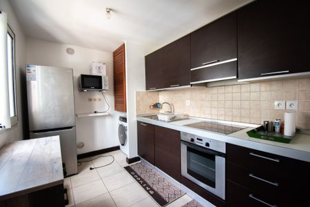 Location Appartement 3 pièces 56m² ST DENIS 97400 - Photo 5