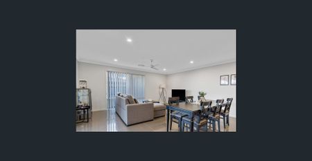 "DUCTED AIR CONDITIONING FOR THE SUMMER MONTHS AHEAD" - Photo 3