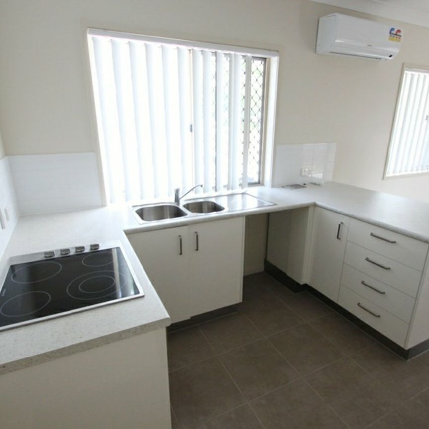 Convenient & Low-Maintenance Living in Prime Location - Photo 1
