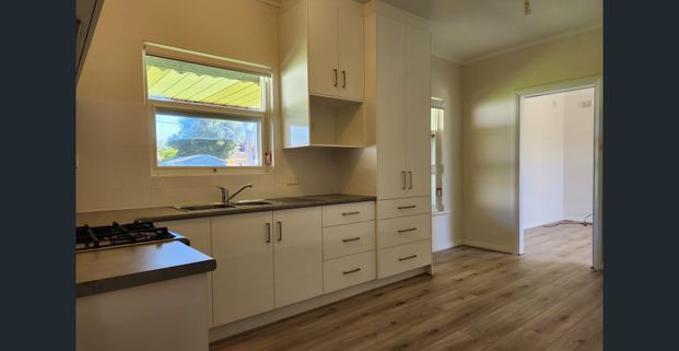 RENOVATED THREE BEDROOM FAMILY HOME - Photo 1