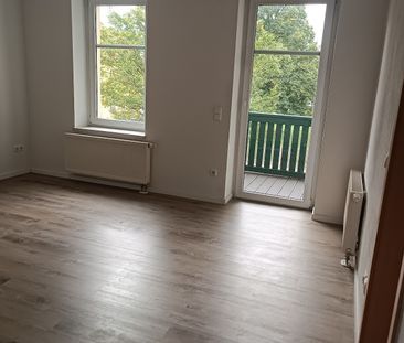 Praktische Singlewohnung mit moderner Einbauküche und Balkon! - Photo 1