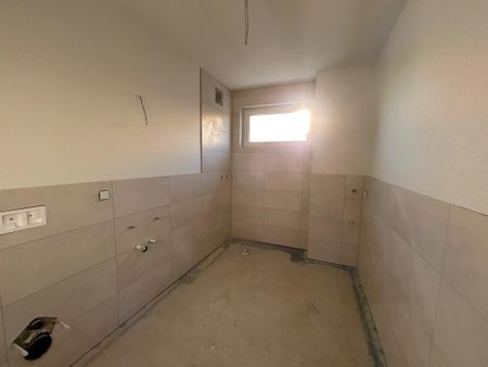 Erstbezug mit Aufzug und EBK in Tessin! - Photo 2