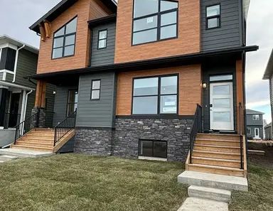 NEW Duplex in Rockland Park – Modern Comfort Meets Natural Beauty! | 527 Rowmont Boulevard Northwest, Calgary - Photo 1