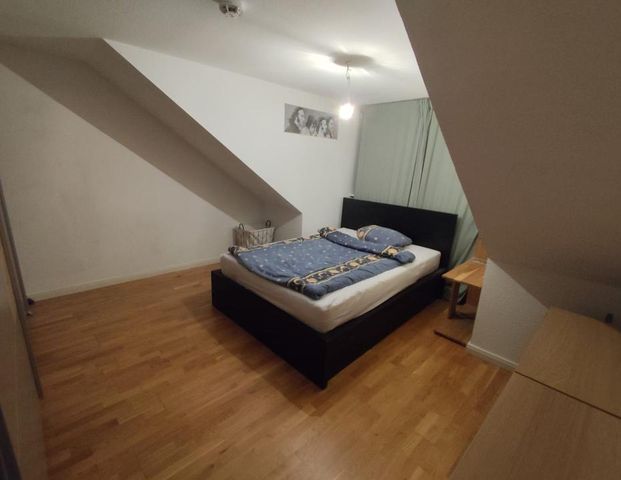 Gemütl. Dachgeschosswohnung in ruhiger Lage und guter Anbindung - Foto 1