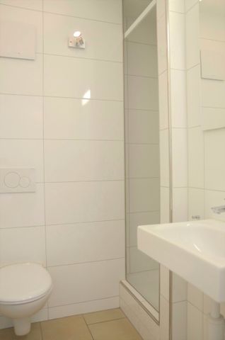 "moderne 1.5-Zimmer-Wohnung mit Balkon und Lift im Haus an zentraler Lage" - Photo 4
