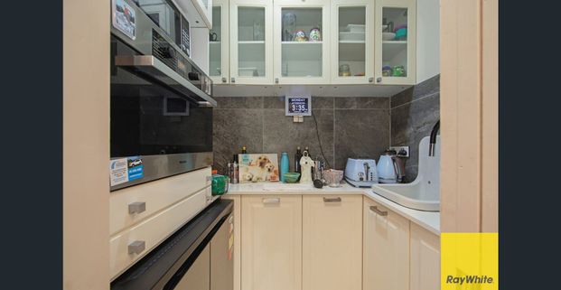 Carefree Coastal living in a Boutique Beachside Apartment - Photo 1