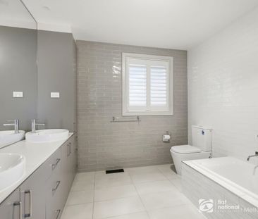 Stylish Renovated Home Offering Comfort and Space - Photo 6