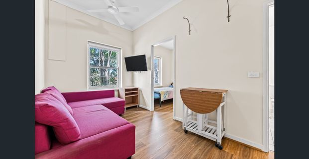 Fully Furnished Gem with Parking — City Living Made Easy - Photo 1