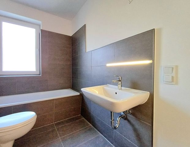 Lichtdurchflutete 3-Zimmer-Wohnung mit Balkon - Foto 1