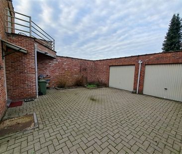 Een rustig gelegen gelijkvloers appartement met garage - Photo 2