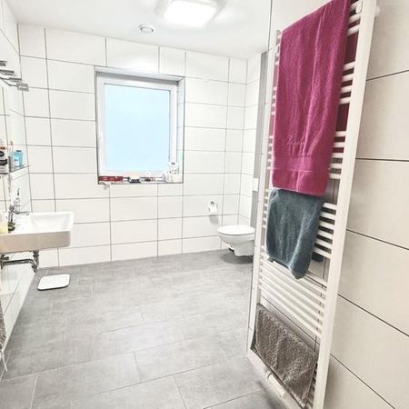 Moderne 3-Zimmer-Erdgeschosswohnung mit Terrasse - Foto 4