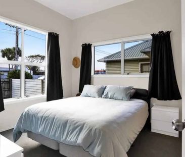 Tidy 3-Bedroom Home with Large Covered Deck - Photo 3