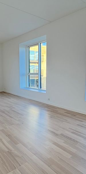 Nyere lys lejlighed i populært område - Photo 2