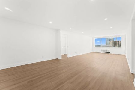 Charles West — 2 Bedroom + Den - Photo 4