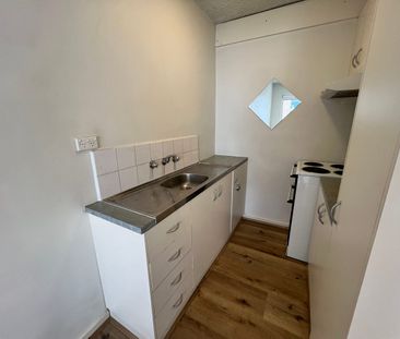 One-Bedroom Lifestyle Living Steps from It All - Photo 2