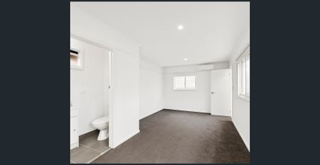 Freshly updated and offering rare 5-bedroom flexibility. - Photo 5