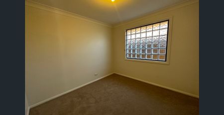 Low Maintenance Three Bedroom Unit in Convenient Location - Photo 3