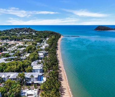 Corner Coastal Retreat – Furnished Apartment Moments from the Beach - Photo 1