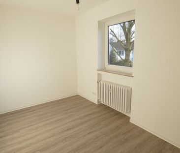 Hervorragende Erdgeschoss-Wohnung mit Balkon - Foto 6