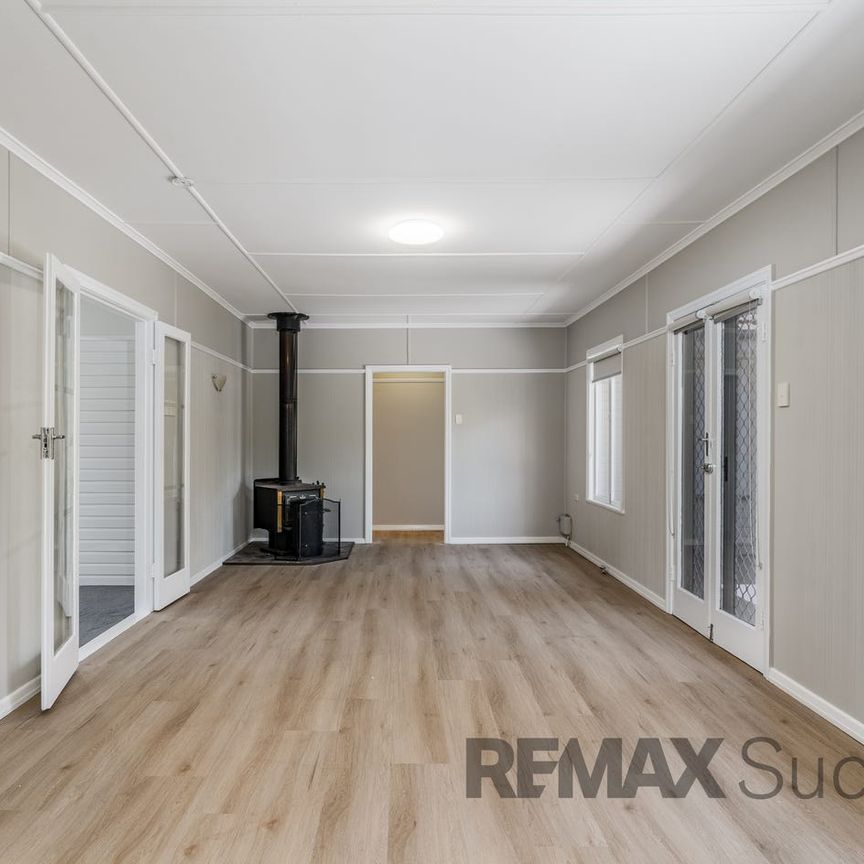 Spacious Family Home with Multiple Living Areas in Prime Rangeville Location - Photo 1