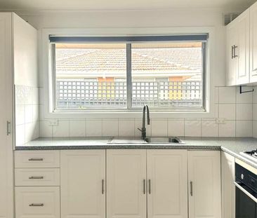 Bright, Spacious & Well-Located - Photo 3