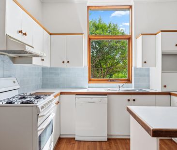 Character Home with Expansive North-Facing Rear Yard - Photo 2