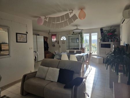 Location Maison 4 pièces 89 m2 à Saint-Laurent-de-Carnols - Photo 2