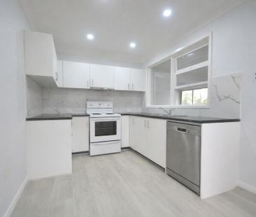 Modern Light Filled Home with Fresh Renovations - Photo 5