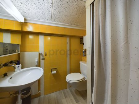 Furnished 2-room attic apartment with beautiful mountain views in Andiast - Photo 2