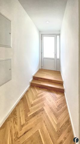 Elegante Wohnung mit großer Terrasse im Zentrum - Photo 3