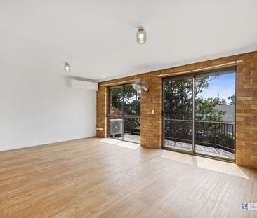 Modern 2-Bedroom Unit in Sought-After Location - Photo 4