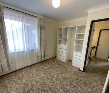 Well-Maintained Two-Storey Unit in Secure, Central Complex - Photo 2