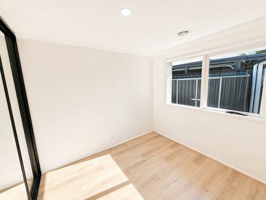 Freshly Updated Family Home with Flexible Living & Secure Parking - Photo 1