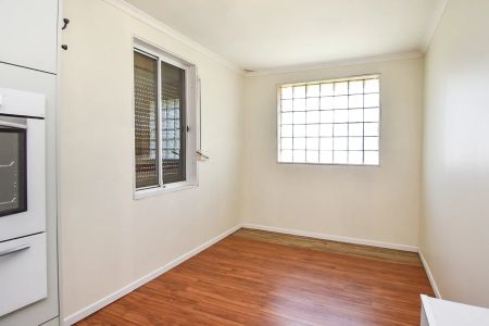 Three-Bedroom Home with Secure Yard - Photo 2