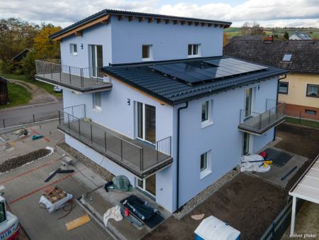 GEMÜTLICH, MODERN, ENERGIEEFFIZIENT: Fünf 2 Zimmer- Mietwohnungen mit Außenflächen warten auf Sie! - Foto 2