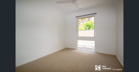 Stylish Family Home Backing onto Reserve - Photo 2