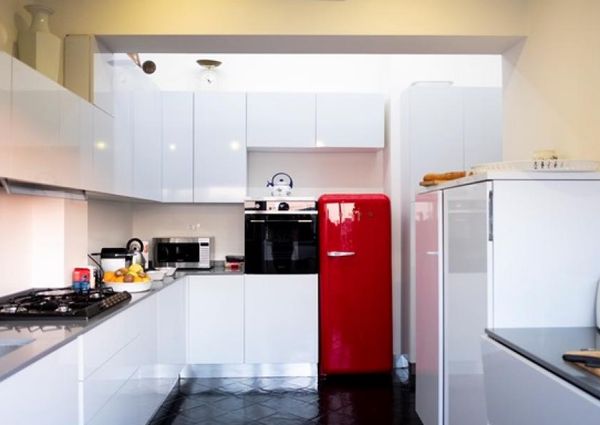 Attic-Monti: Spacious, furnished 3 Bedroom, 2 bath, living room, dining room, study and large panoramic terrace. Bright, silent, located in well kept Palazzo d’Epoca with elevator and doorman. Near transport and Metro.