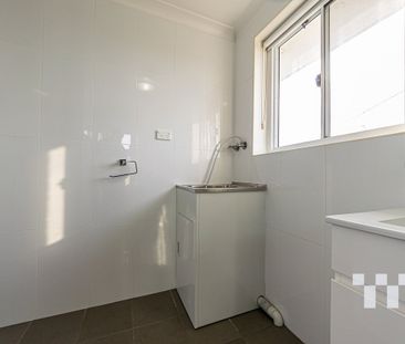 Comfortable One-Bedder With Garage & Convenience at Your Doorstep - Photo 5