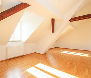 Großzügige 3-Zimmer-Dachgeschosswohnung in Neuaubing - Foto 1