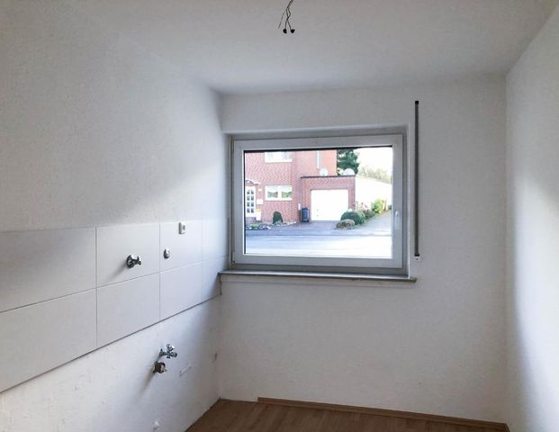 Gut geschnittene EG Wohnung mit Balkon und Garage - Foto 1