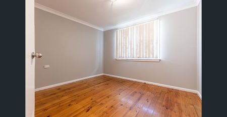 Neat and tidy home in a very central location! - Photo 2