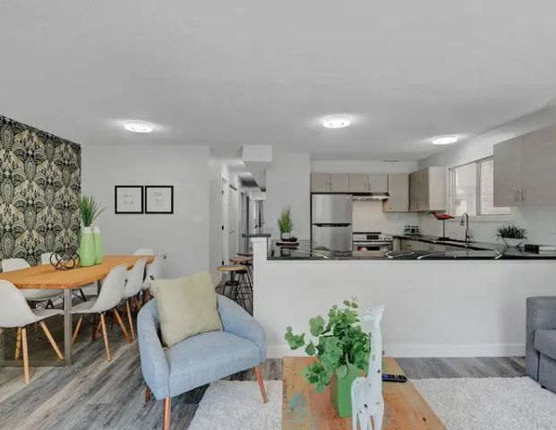 Fully Furnished 3 bedroom Suit Walking distance from SAIT and Federation park | A - 1218 18 Avenue Northwest, Calgary - Photo 1