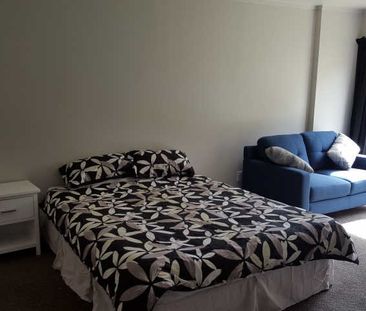 This large self contained studio room wont last long. - Photo 1