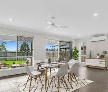Family Home with Large Backyard and Air Conditioning! - Photo 1
