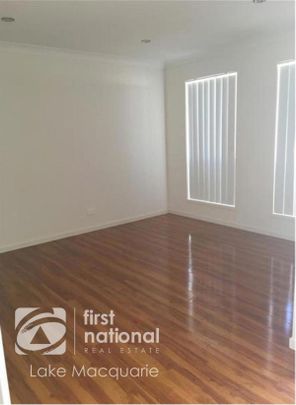 Modern 4-Bedroom Family Home - Photo 1