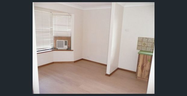 Hi, I’m your smart and functional 2-bedroom unit in a prestigious school zone - Photo 1