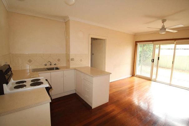 Affordable Neat & Tidy Unit Located Close to the CBD - Photo 1