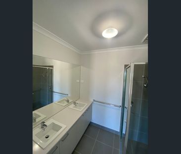 Modern 4-Bedroom Home in a Peaceful Estate - Photo 5