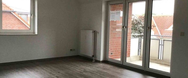 Helle Dachgeschosswohnung mit Balkon! - Foto 1